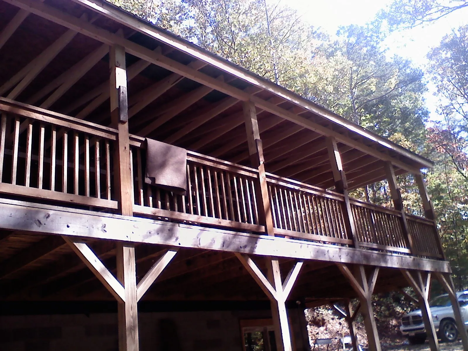 Timber framing under a new elevated porch and deck — Roof Leak Repair in Sula by Roofing Brothers